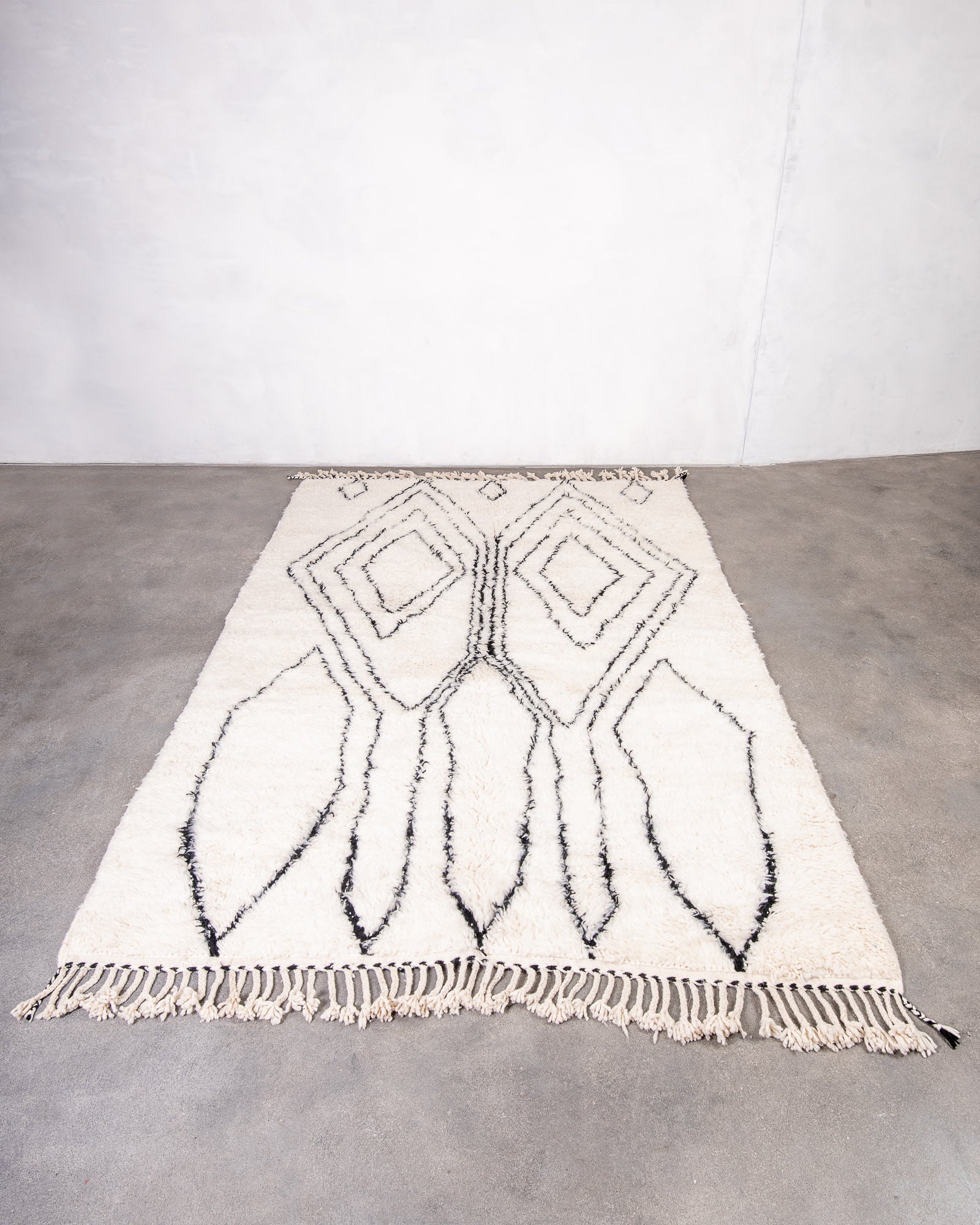 Modern, designer, handcrafted Berber rug from Morocco. Beniourain carpet with beautiful colours and patterns and fluffy wool texture.